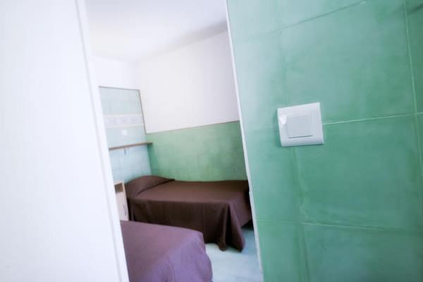 بورتو فيكشْيو Residence Le Relax الغرفة الصورة